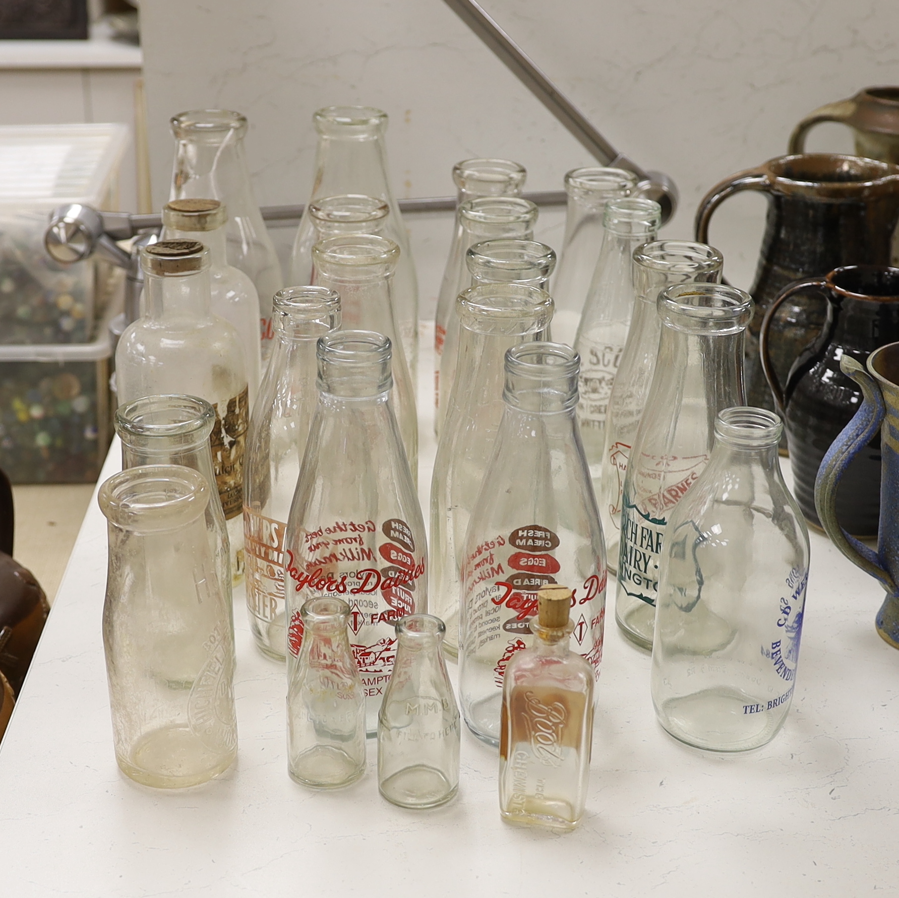 A quantity of vintage glass milk bottles, etc. (23)